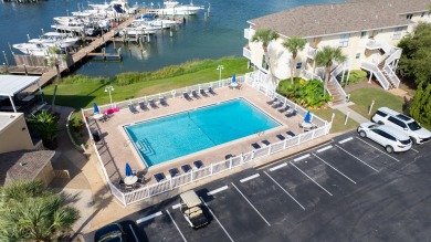 Experience the ultimate in coastal living with this 1-bedroom on Sandpiper Cove Golf Course in Florida - for sale on GolfHomes.com, golf home, golf lot