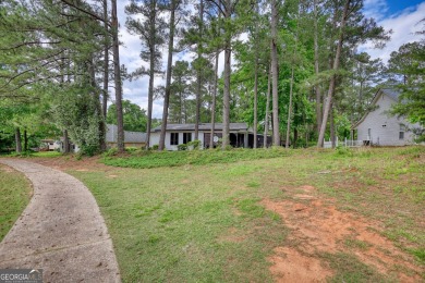 Welcome to this stunning, fully renovated home in the highly on Turtle Cove Golf Course in Georgia - for sale on GolfHomes.com, golf home, golf lot