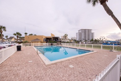 Experience the ultimate in coastal living with this 1-bedroom on Sandpiper Cove Golf Course in Florida - for sale on GolfHomes.com, golf home, golf lot