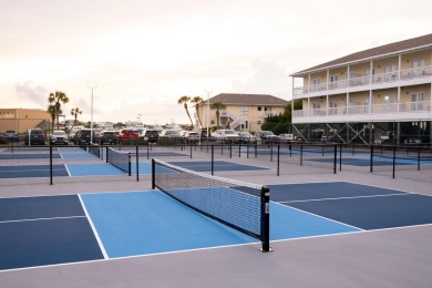 Experience the ultimate in coastal living with this 1-bedroom on Sandpiper Cove Golf Course in Florida - for sale on GolfHomes.com, golf home, golf lot