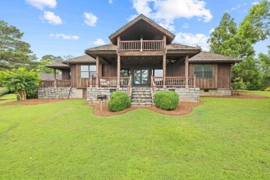 Experience breathtaking lake views from this charming 3-bedroom on The Golf Club at Cuscowilla in Georgia - for sale on GolfHomes.com, golf home, golf lot
