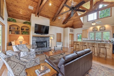 Experience breathtaking lake views from this charming 3-bedroom on The Golf Club at Cuscowilla in Georgia - for sale on GolfHomes.com, golf home, golf lot