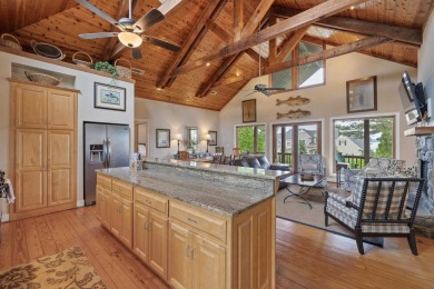 Experience breathtaking lake views from this charming 3-bedroom on The Golf Club at Cuscowilla in Georgia - for sale on GolfHomes.com, golf home, golf lot