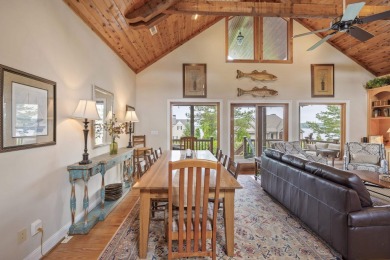 Experience breathtaking lake views from this charming 3-bedroom on The Golf Club at Cuscowilla in Georgia - for sale on GolfHomes.com, golf home, golf lot