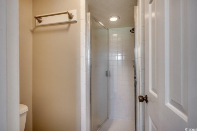 Welcome to this classic 3-bedroom, 2.5-bath brick home in the on The Dunes Golf and Beach Club in South Carolina - for sale on GolfHomes.com, golf home, golf lot