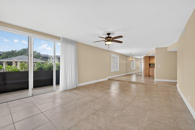 SPACIOUS FIRST FLOOR CORNER UNIT FILLED WITH NATURAL LIGHT on BallenIsles Golf and Country Club in Florida - for sale on GolfHomes.com, golf home, golf lot