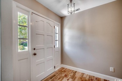Welcome to this classic 3-bedroom, 2.5-bath brick home in the on The Dunes Golf and Beach Club in South Carolina - for sale on GolfHomes.com, golf home, golf lot