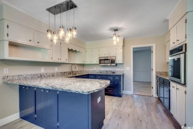 Welcome to this classic 3-bedroom, 2.5-bath brick home in the on The Dunes Golf and Beach Club in South Carolina - for sale on GolfHomes.com, golf home, golf lot