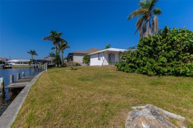 Punta Gorda Isles - Sailboat Gulf Access Waterfront Home with on Saint Andrews South Golf Club in Florida - for sale on GolfHomes.com, golf home, golf lot