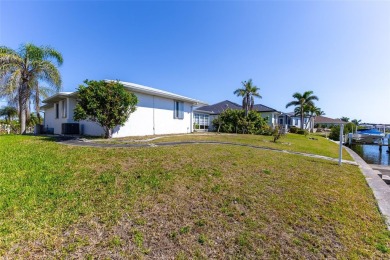 Punta Gorda Isles - Sailboat Gulf Access Waterfront Home with on Saint Andrews South Golf Club in Florida - for sale on GolfHomes.com, golf home, golf lot