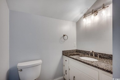 Welcome to this classic 3-bedroom, 2.5-bath brick home in the on The Dunes Golf and Beach Club in South Carolina - for sale on GolfHomes.com, golf home, golf lot