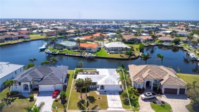 Punta Gorda Isles - Sailboat Gulf Access Waterfront Home with on Saint Andrews South Golf Club in Florida - for sale on GolfHomes.com, golf home, golf lot