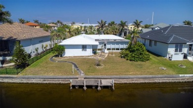 Punta Gorda Isles - Sailboat Gulf Access Waterfront Home with on Saint Andrews South Golf Club in Florida - for sale on GolfHomes.com, golf home, golf lot