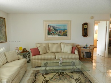 Light, bright, and truly feels like home! This spacious CORNER on Pembroke Lakes Golf Club in Florida - for sale on GolfHomes.com, golf home, golf lot
