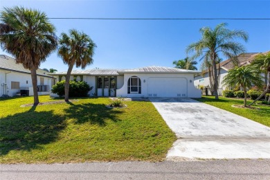 Punta Gorda Isles - Sailboat Gulf Access Waterfront Home with on Saint Andrews South Golf Club in Florida - for sale on GolfHomes.com, golf home, golf lot