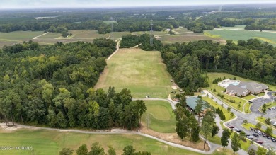 Welcome to this exceptional 5-bedroom, 3-bathroom home located on The Golf Club At Rocky Mount in North Carolina - for sale on GolfHomes.com, golf home, golf lot