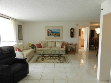 Light, bright, and truly feels like home! This spacious CORNER on Pembroke Lakes Golf Club in Florida - for sale on GolfHomes.com, golf home, golf lot