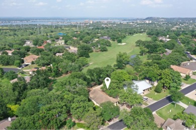 Gorgeous single-level golf course home nestled on a tree-covered on Slick Rock Golf Course - Horseshoe Bay in Texas - for sale on GolfHomes.com, golf home, golf lot