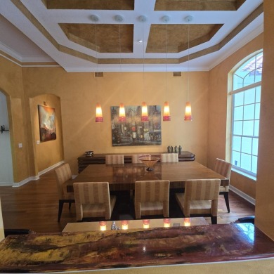 Welcome to 8212 Kiawah Trace, an exquisite custom-built on PGA Golf Club in PGA Village in Florida - for sale on GolfHomes.com, golf home, golf lot