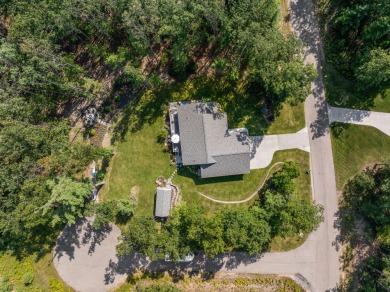 Meticulously maintained and beautifully updated, this stunning on Indian River Golf Club in Michigan - for sale on GolfHomes.com, golf home, golf lot