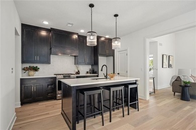 Discover modern, low-maintenance luxury living in this stunning on The Golf Club of Kansas in Kansas - for sale on GolfHomes.com, golf home, golf lot