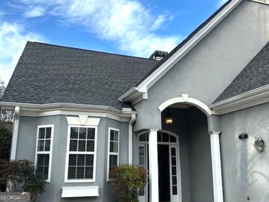 Welcome Home! Charming ranch plan with airy 2-story foyer in on Canongate At Flat Creek Club in Georgia - for sale on GolfHomes.com, golf home, golf lot