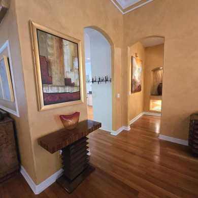 Welcome to 8212 Kiawah Trace, an exquisite custom-built on PGA Golf Club in PGA Village in Florida - for sale on GolfHomes.com, golf home, golf lot