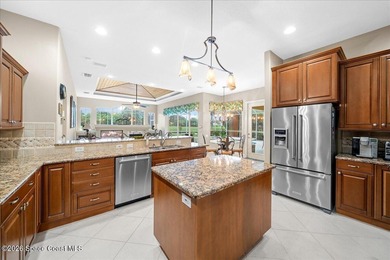 Tucked away on a private cul-de-sac in the gated subdivision of on Baytree National Golf Links in Florida - for sale on GolfHomes.com, golf home, golf lot