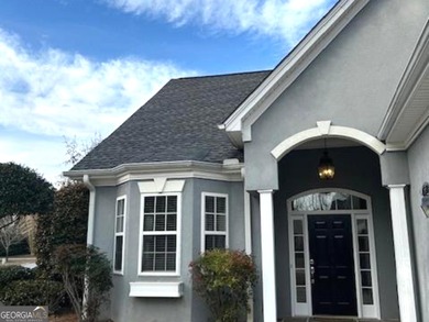 Welcome Home! Charming ranch plan with airy 2-story foyer in on Canongate At Flat Creek Club in Georgia - for sale on GolfHomes.com, golf home, golf lot