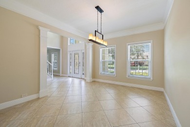 Nestled in a cul-de-sac in the sought-after community of Egret on The Golf Club of Jupiter in Florida - for sale on GolfHomes.com, golf home, golf lot