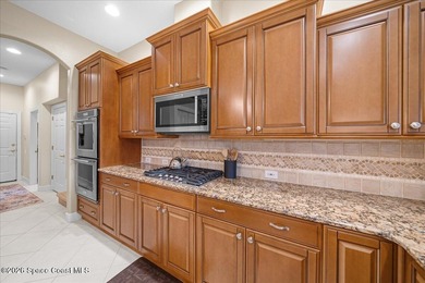 Tucked away on a private cul-de-sac in the gated subdivision of on Baytree National Golf Links in Florida - for sale on GolfHomes.com, golf home, golf lot