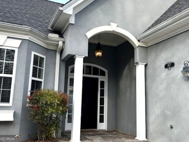 Welcome Home! Charming ranch plan with airy 2-story foyer in on Canongate At Flat Creek Club in Georgia - for sale on GolfHomes.com, golf home, golf lot