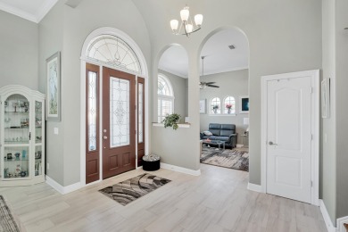 Tucked behind the private gates of the Bay Point community, this on Bay Point Resort Golf Club in Florida - for sale on GolfHomes.com, golf home, golf lot