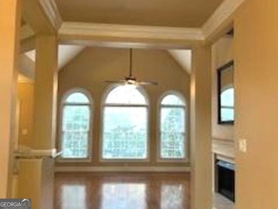 Welcome Home! Charming ranch plan with airy 2-story foyer in on Canongate At Flat Creek Club in Georgia - for sale on GolfHomes.com, golf home, golf lot