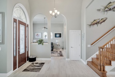 Tucked behind the private gates of the Bay Point community, this on Bay Point Resort Golf Club in Florida - for sale on GolfHomes.com, golf home, golf lot