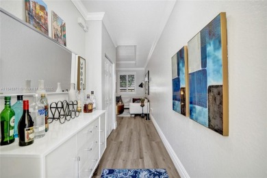 Live in the charming, historic Parrot Cove neighborhood of Lake on Lake Worth Municipal Golf Course in Florida - for sale on GolfHomes.com, golf home, golf lot