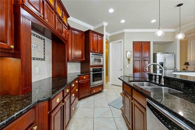 Welcome to this exceptional preserve-view pool home in the gated on River Wilderness Golf and Country Club in Florida - for sale on GolfHomes.com, golf home, golf lot