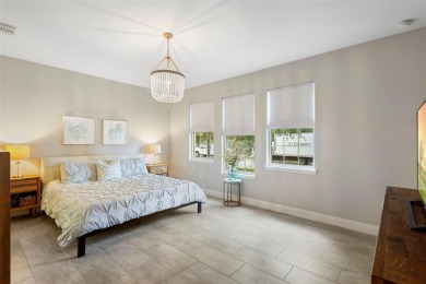 Welcome home to your stunning front porch LAKE VIEWS, on this on Orange County National Golf Center and Lodge in Florida - for sale on GolfHomes.com, golf home, golf lot