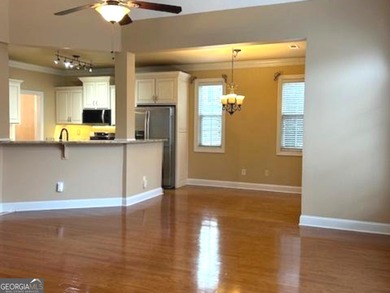 Welcome Home! Charming ranch plan with airy 2-story foyer in on Canongate At Flat Creek Club in Georgia - for sale on GolfHomes.com, golf home, golf lot