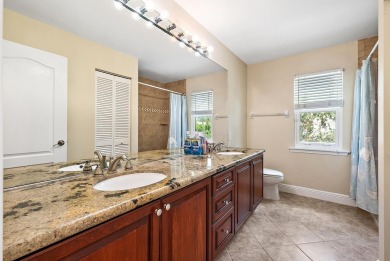 Nestled in a cul-de-sac in the sought-after community of Egret on The Golf Club of Jupiter in Florida - for sale on GolfHomes.com, golf home, golf lot