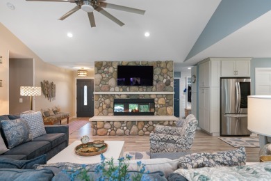 Meticulously maintained and beautifully updated, this stunning on Indian River Golf Club in Michigan - for sale on GolfHomes.com, golf home, golf lot