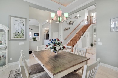 Tucked behind the private gates of the Bay Point community, this on Bay Point Resort Golf Club in Florida - for sale on GolfHomes.com, golf home, golf lot
