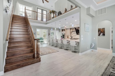 Tucked behind the private gates of the Bay Point community, this on Bay Point Resort Golf Club in Florida - for sale on GolfHomes.com, golf home, golf lot