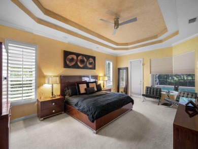 Welcome to 8212 Kiawah Trace, an exquisite custom-built on PGA Golf Club in PGA Village in Florida - for sale on GolfHomes.com, golf home, golf lot