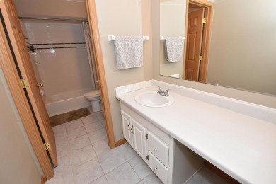 Enjoy open-concept living in this modern upper-level condo on BlackStone Creek Golf Club in Wisconsin - for sale on GolfHomes.com, golf home, golf lot