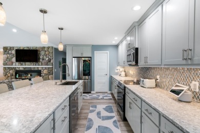 Meticulously maintained and beautifully updated, this stunning on Indian River Golf Club in Michigan - for sale on GolfHomes.com, golf home, golf lot
