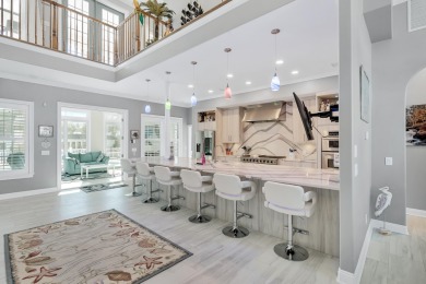 Tucked behind the private gates of the Bay Point community, this on Bay Point Resort Golf Club in Florida - for sale on GolfHomes.com, golf home, golf lot