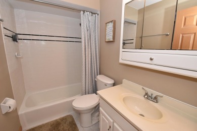 Enjoy open-concept living in this modern upper-level condo on BlackStone Creek Golf Club in Wisconsin - for sale on GolfHomes.com, golf home, golf lot