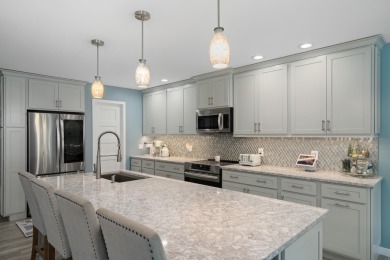 Meticulously maintained and beautifully updated, this stunning on Indian River Golf Club in Michigan - for sale on GolfHomes.com, golf home, golf lot