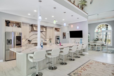 Tucked behind the private gates of the Bay Point community, this on Bay Point Resort Golf Club in Florida - for sale on GolfHomes.com, golf home, golf lot